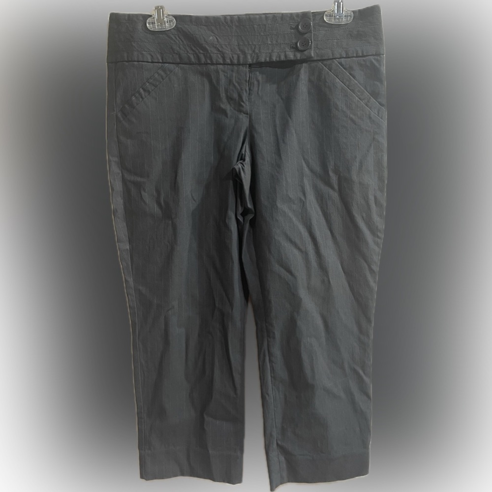 The Limited extra stretch black pin stripe capris! Super cute button detail.